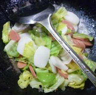 牛肉肠圆白菜炒年糕的做法步骤：12