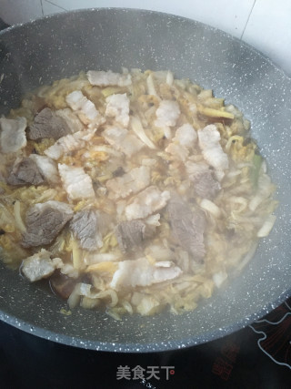 猪肉粉条炖酸菜的做法步骤：21