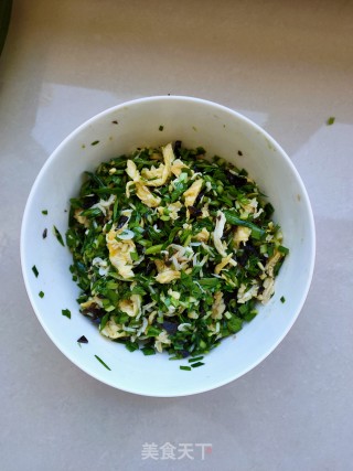 韭菜鸡蛋素馅煎包的做法步骤：7