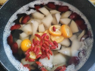 金桔雪梨汁的做法步骤：5