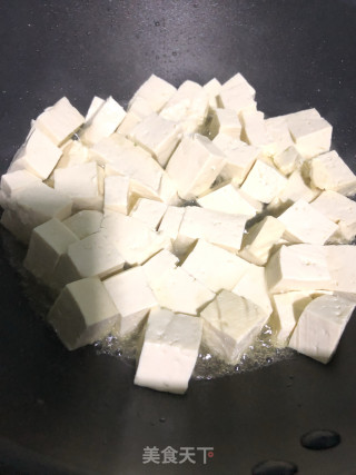 煎豆腐蛤蜊的做法步骤：2