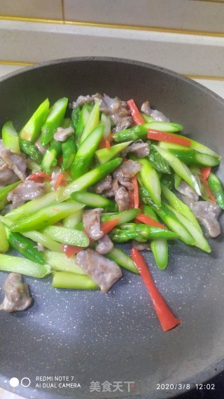 猪肉炒芦笋的做法步骤：7
