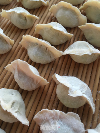 “春日应季美食”韭菜海鲜水饺的做法步骤：21