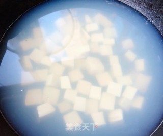花蛤豆腐时蔬汤的做法步骤：7