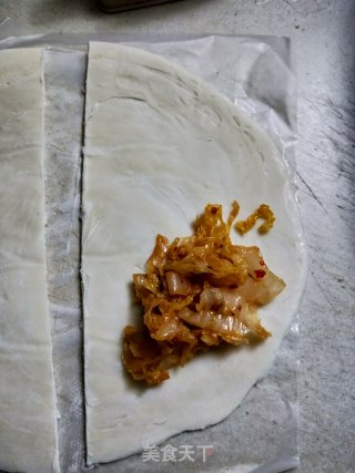 手抓饼版的酸菜饼的做法步骤：6