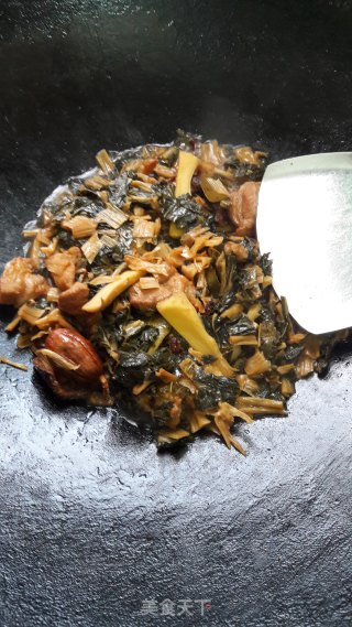 菜干焖肉的做法步骤：11