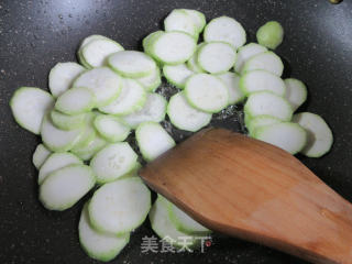榨菜丝蚕豆煮夜开花的做法步骤：4