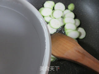 榨菜丝蚕豆煮夜开花的做法步骤：5