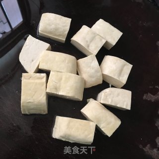 白豆干焖瘦肉的做法步骤：1