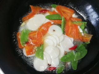 荷兰豆胡萝卜炒年糕的做法步骤：10