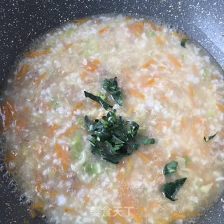 胡萝卜鲍鱼粥的做法步骤：16