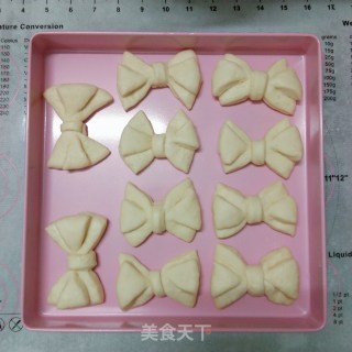 少女心爆棚❗超柔软奶香浓郁的蝴蝶结????面包的做法步骤：12