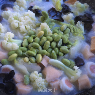 上汤木耳炖时蔬的做法步骤：7