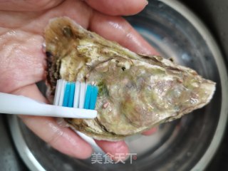 蒸生蚝（附生蚝处理方法）的做法步骤：1