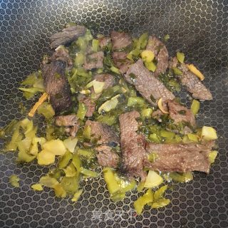 酸菜炒牛肉的做法步骤：6