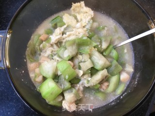 鲜贝鸡蛋丝瓜汤的做法步骤：15
