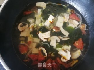 海带芽松茸豆腐清汤的做法步骤：7