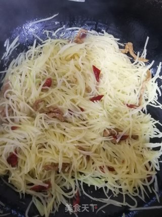 土豆丝炒肉的做法步骤：7
