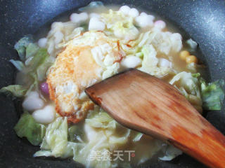 煎鸡蛋包心菜花色年糕的做法步骤：6