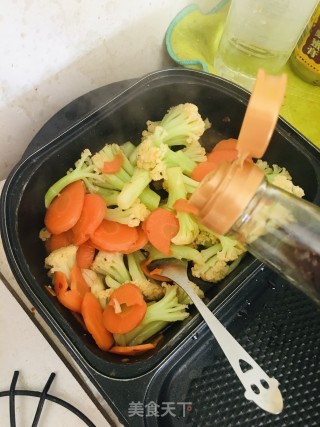 蒜香有机菜花配胡萝卜的做法步骤：6