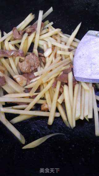 土豆炒猪肉的做法步骤：6