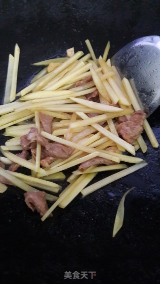 土豆炒猪肉的做法步骤：7