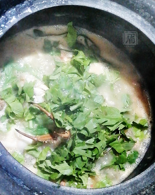 砂锅海鲜粥的做法步骤：9