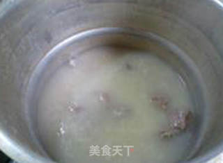 排骨皮蛋大米粥的做法步骤：9