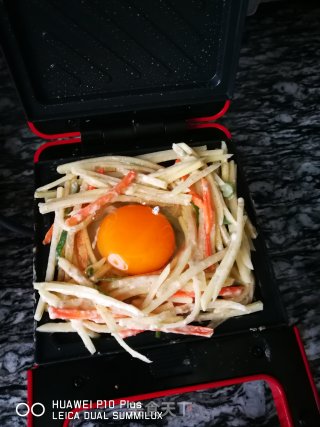 快手早餐：鸟巢煎蛋的做法步骤：6