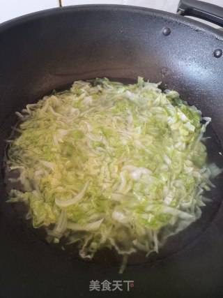 卷心菜炖粉丝的做法步骤：4