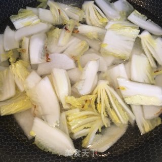 娃娃菜萝卜炖蛋饺的做法步骤：6