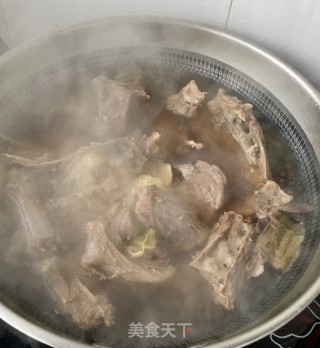 土豆炖大鹅的做法步骤：15
