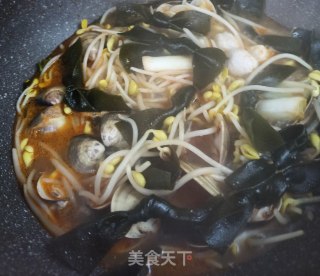 海带结豆芽炖花蛤的做法步骤：6