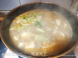 鸡肉酸菜炖豆腐的做法步骤：6