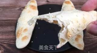 空心糖饼，趁热咬一大口，入口酥脆加上甜蜜的糖汁、满满幸福感。的做法步骤：16