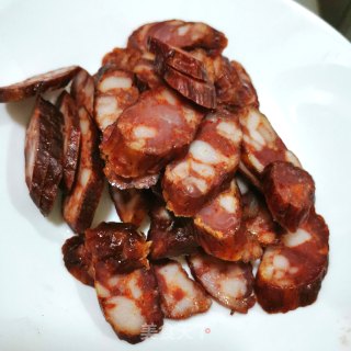 荷兰豆炒麻辣肠的做法步骤：4