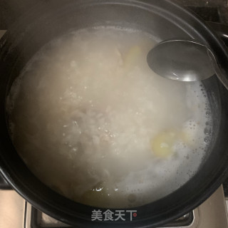 鱼头干鱿煲粥的做法步骤：8