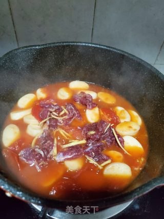 番茄牛肉炖年糕的做法步骤：7