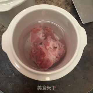 莲子排骨粥的做法步骤：2