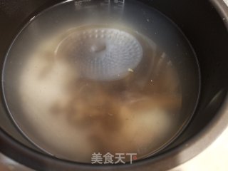 海参干贝粥的做法步骤：6