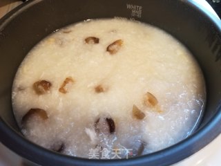 海参干贝粥的做法步骤：7