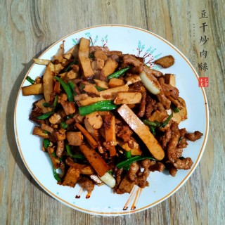 豆干炒肉丝的做法步骤：7