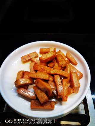 午餐肉炒蒜苔土豆条的做法步骤：9