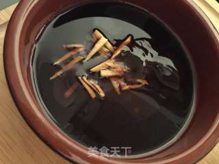 电饭锅腊肠煲仔饭的做法步骤：3