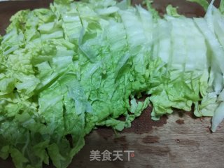 娃娃菜海鲜粥的做法步骤：2