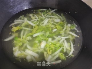 娃娃菜海鲜粥的做法步骤：7