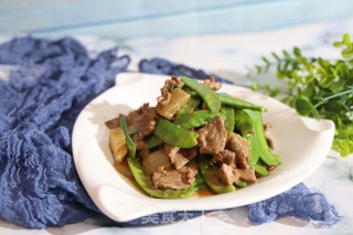牛肉炒荷兰豆的做法步骤：9