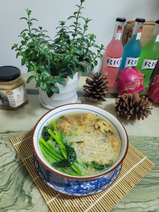 豆腐萝卜丸子煮米粉的做法步骤：8
