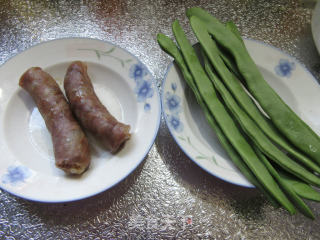 香肠炒油豆角的做法步骤：1