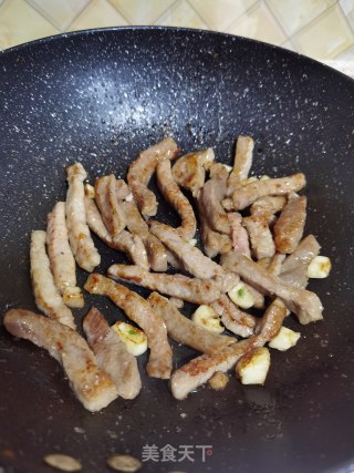 牛柳炒花菜的做法步骤：13